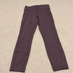 Lululemon 7/8 pants. I think they are the wunder train. Fit snug. Never worn.